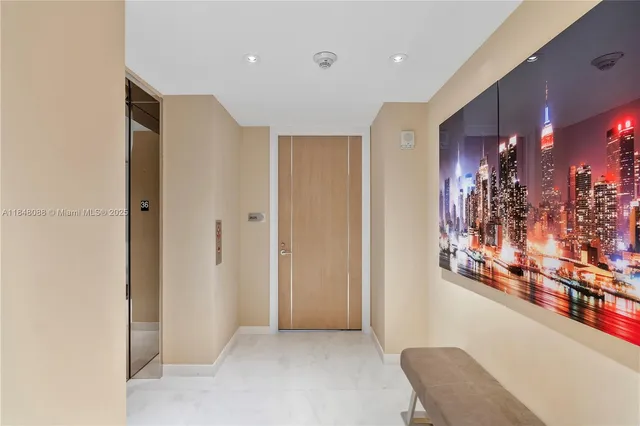 a view of a hallway with dining area