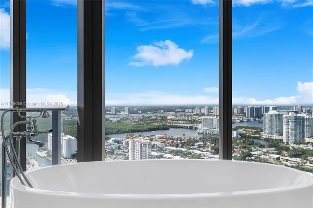a view of a city from a bathtub