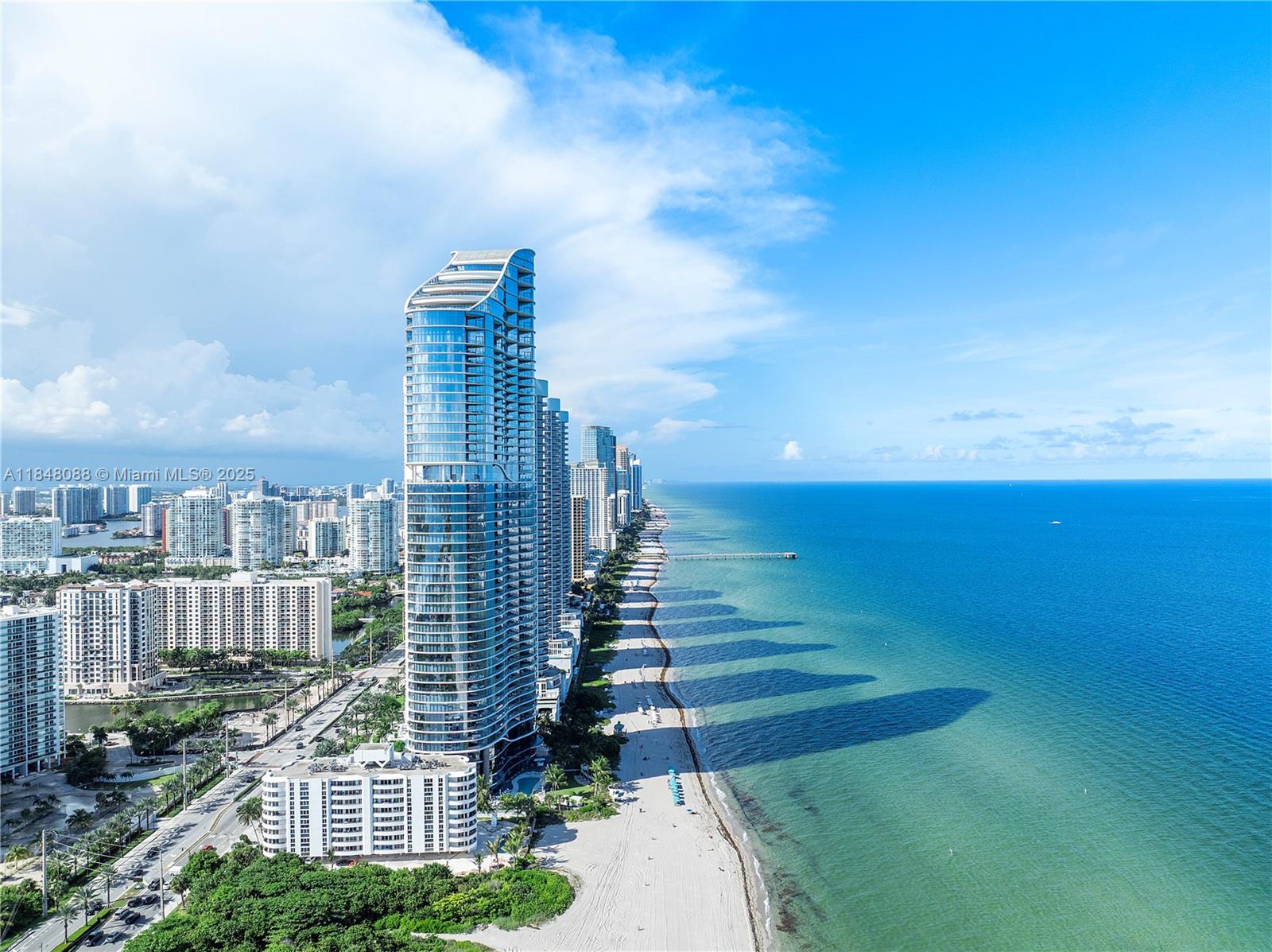 15701 Collins Avenue, Unit 3605 Sunny Isles Beach, FL 33160 - Photo 45 of 46 a view of a city with tall buildings