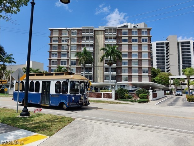 2350 West First Street, Unit 603 Fort Myers, FL 33901 - Photo 12 of 17 a car parked in front of a building