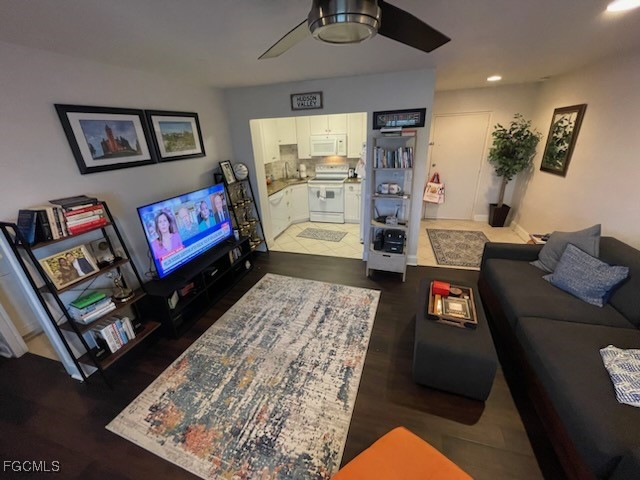 2350 West First Street, Unit 603 Fort Myers, FL 33901 - Photo 6 of 17 a living room with furniture and a flat screen tv