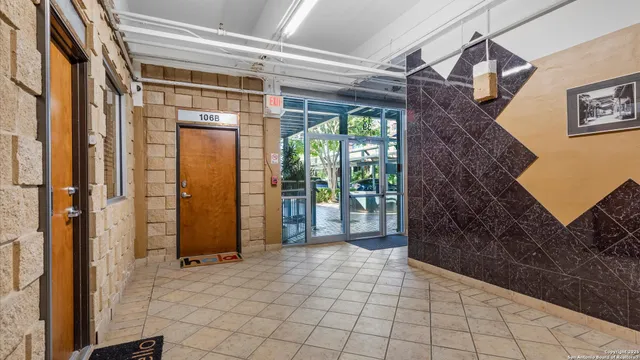 a view of livingroom and dining area with furniture