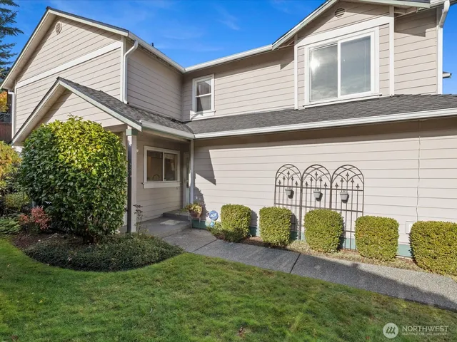 a backyard of a house with lots of green space