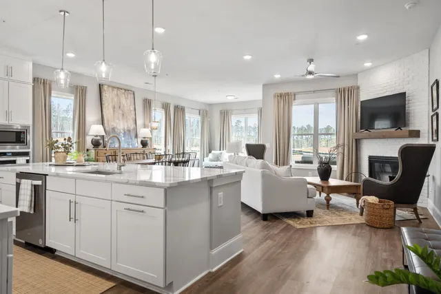 a kitchen with living room and living room