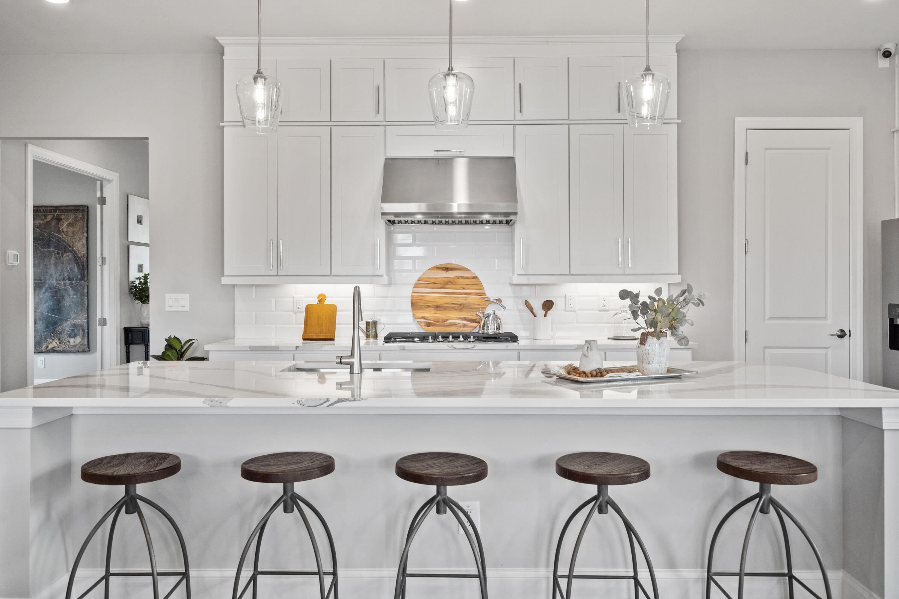 160 Brizo Lane, Unit LOT 10 Santa Rosa Beach, FL 32459 - Photo 26 of 45 a kitchen with stainless steel appliances granite countertop a sink and white cabinets