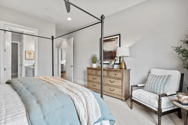 a bedroom with a bed and furniture