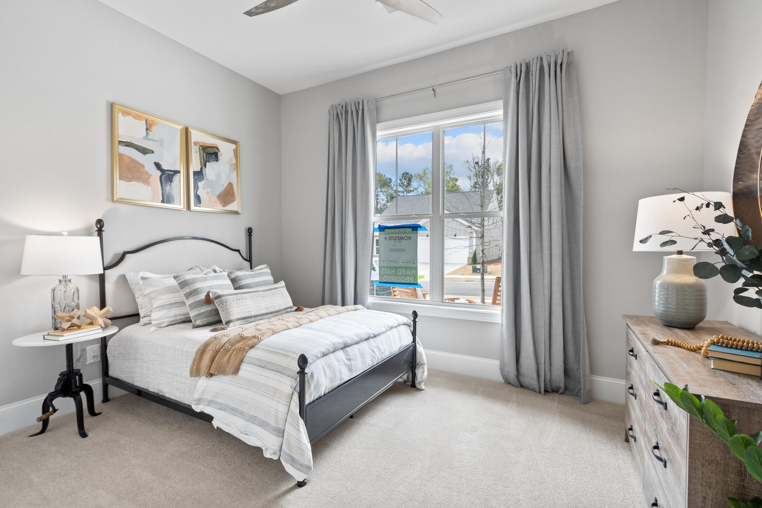 160 Brizo Lane, Unit LOT 10 Santa Rosa Beach, FL 32459 - Photo 5 of 45 a bedroom with a bed and large window