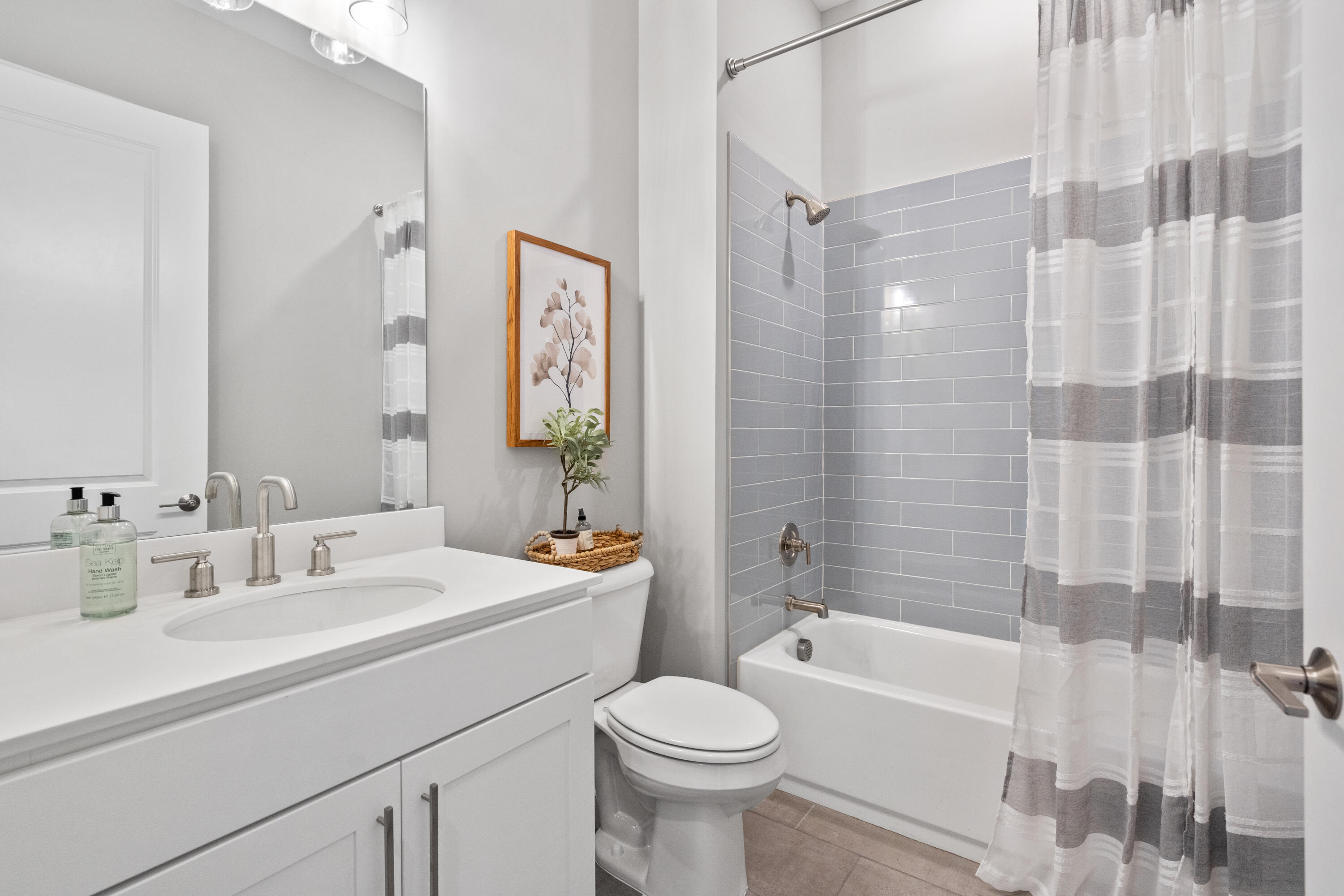 160 Brizo Lane, Unit LOT 10 Santa Rosa Beach, FL 32459 - Photo 7 of 45 a bathroom with a sink toilet and shower