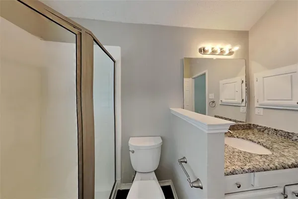 a bathroom with a sink and a toilet
