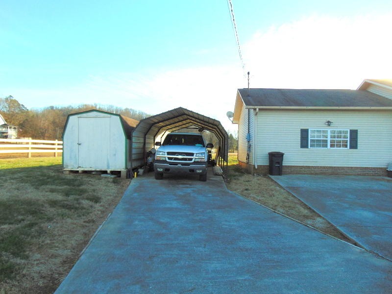 122 Lakescene Road Kingston, TN 37763 - Photo 23 of 37 a house view with a garden space