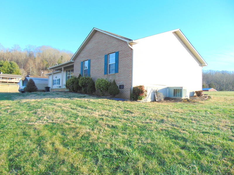 122 Lakescene Road Kingston, TN 37763 - Photo 25 of 37 a view of a house with a yard