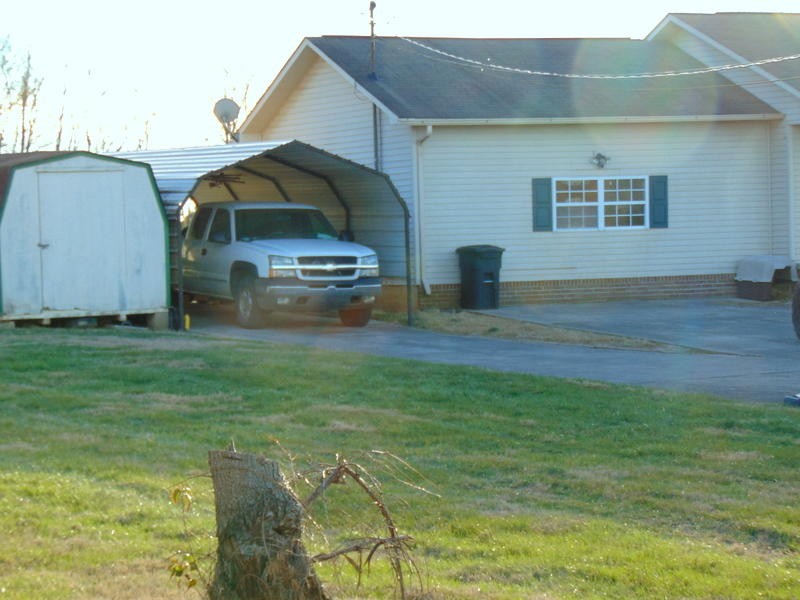 122 Lakescene Road Kingston, TN 37763 - Photo 32 of 37 a house view with a garden space