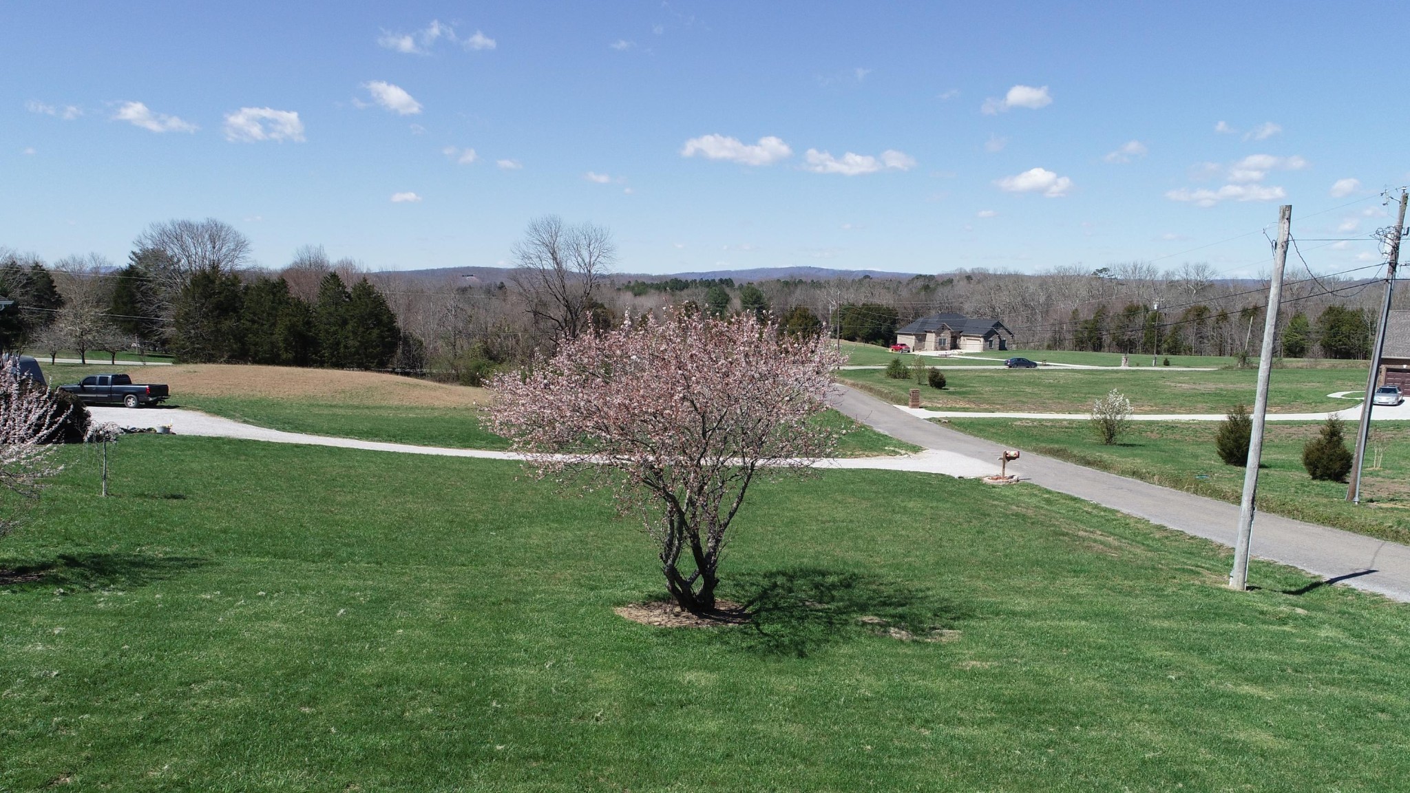 122 Lakescene Road Kingston, TN 37763 - Photo 36 of 37 a view of a golf course with a lake view