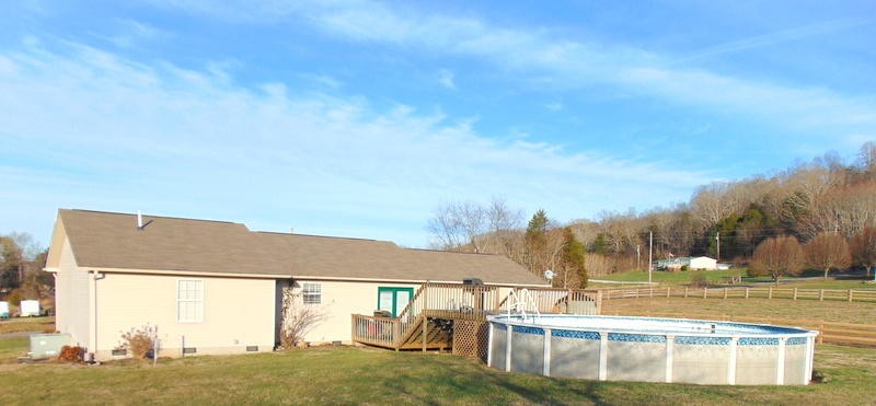 122 Lakescene Road Kingston, TN 37763 - Photo 7 of 37 a view of a swimming pool with an outdoor seating