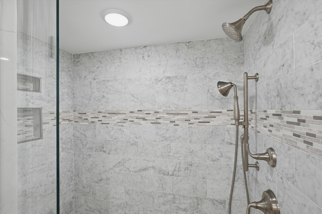 151 High Street, Unit 3B Newburyport, MA 01950 - Photo 22 of 39 a bathroom with a shower