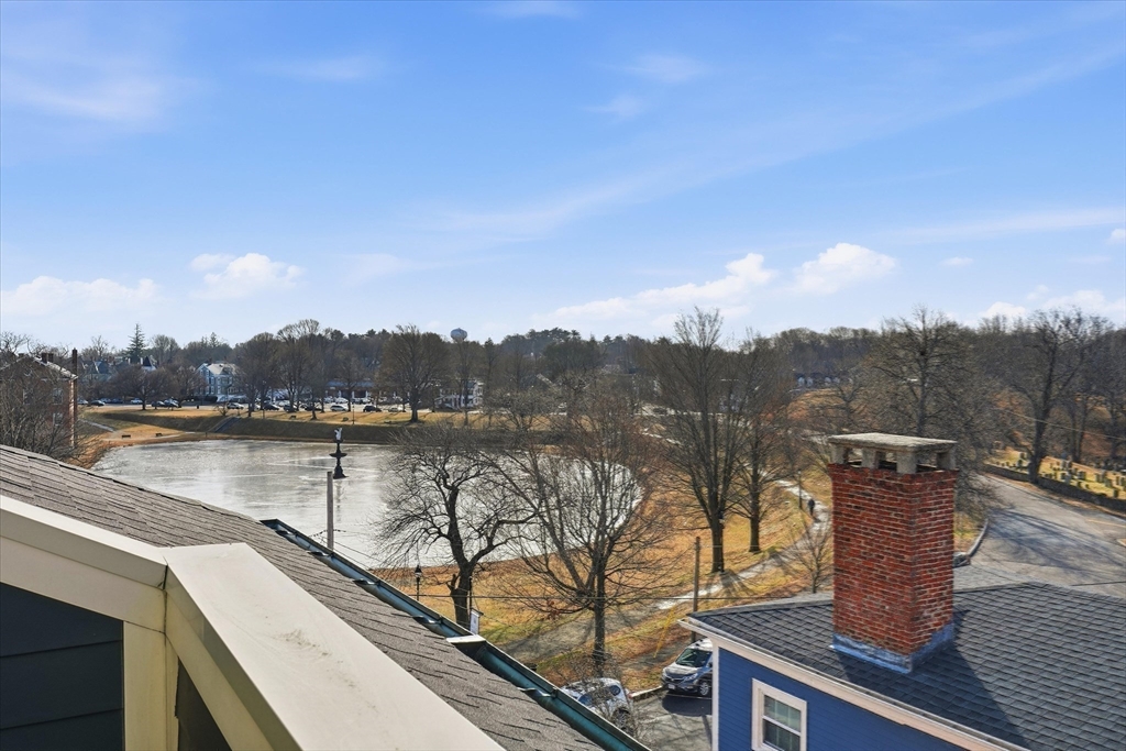 151 High Street, Unit 3B Newburyport, MA 01950 - Photo 28 of 39 a view of a lake with a mountain