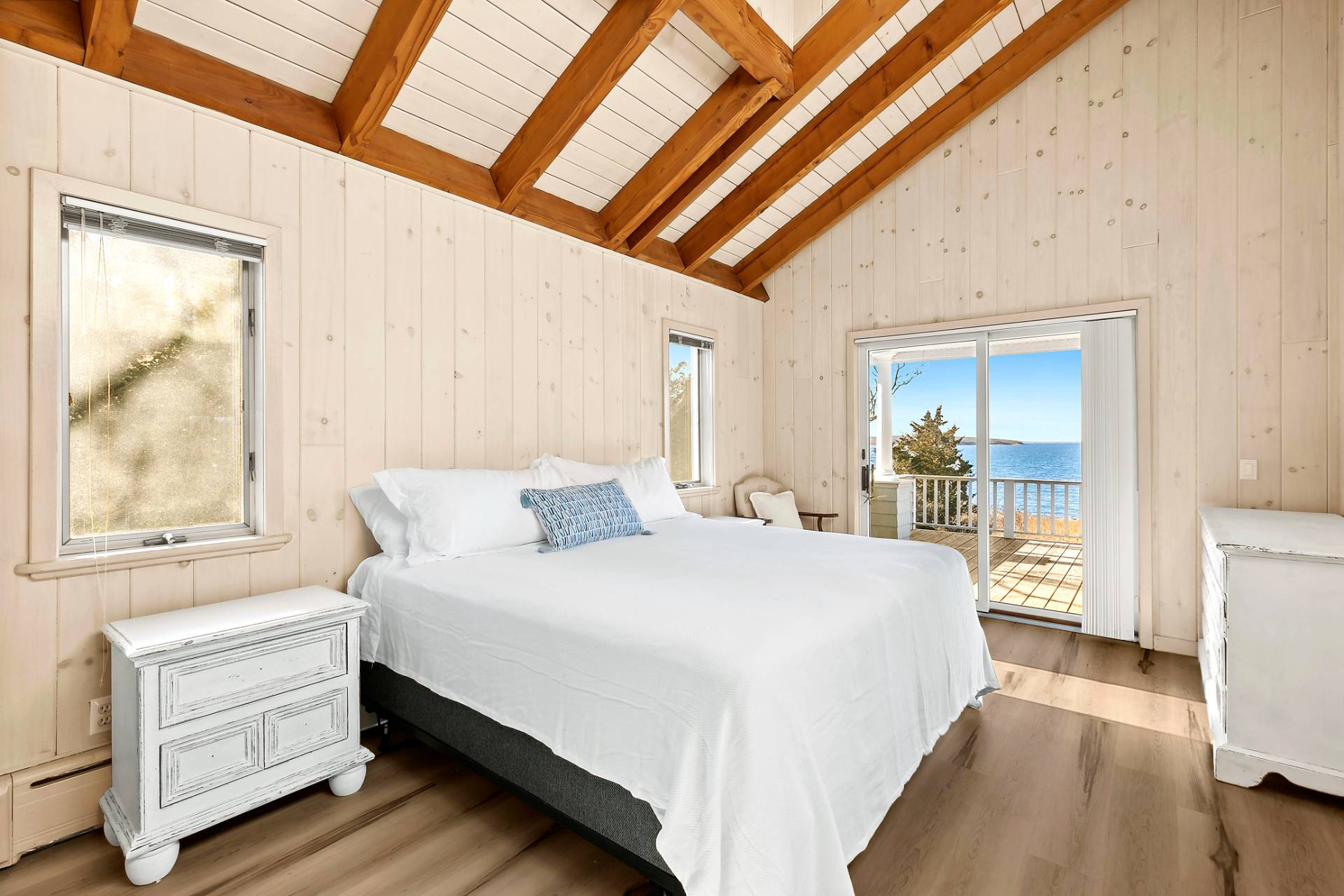 58 Firestone Road Montauk, NY 11954 - Photo 11 of 26 a bedroom with a bed and a window