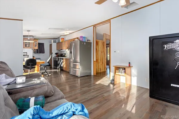 a living room with furniture and a table