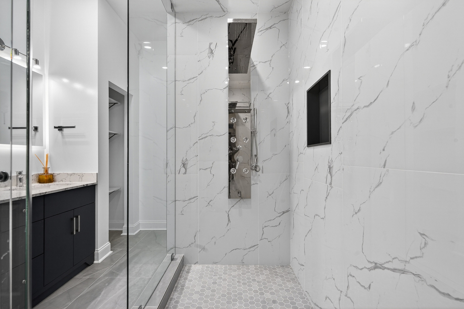 4646 South Prairie Avenue, Unit 2S Chicago, IL 60653 - Photo 13 of 32 a bathroom with a shower and a sink