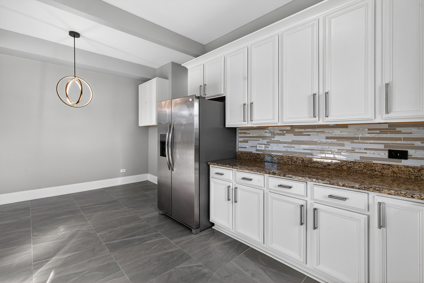 4646 South Prairie Avenue, Unit 2S Chicago, IL 60653 - Photo 21 of 32 a kitchen with appliances cabinets and a counter top space