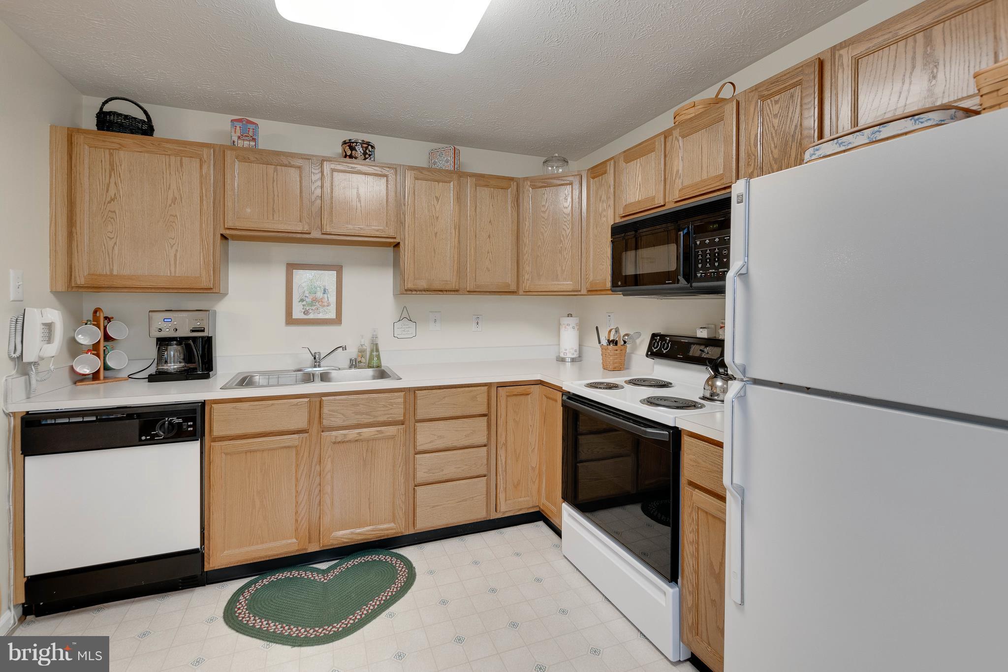 7906 Valley Manor Road, Unit 204 Owings Mills, MD 21117 - Photo 8 of 21 Kitchen - Bright and cheerful