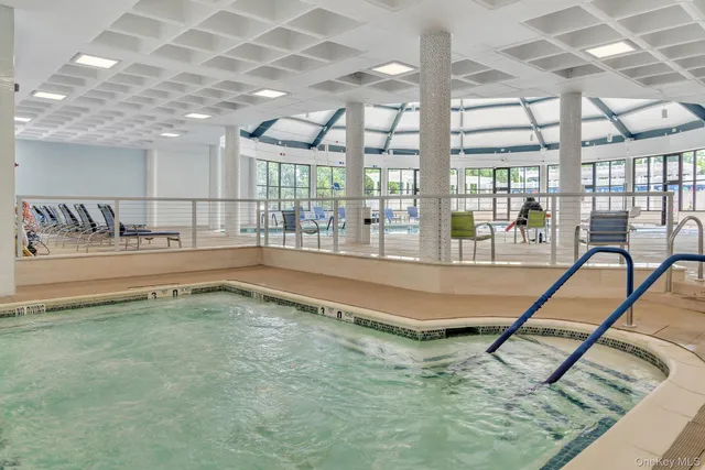 a view of a swimming pool and window
