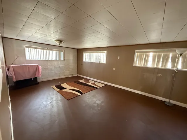 a living room with furniture and window