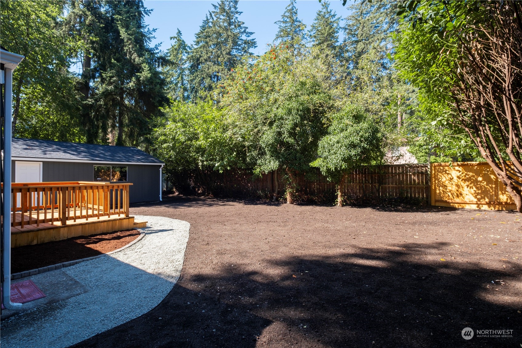11610 Tower Road Southwest Lakewood, WA 98498 - Photo 23 of 35 a view of a wooden floor with a yard