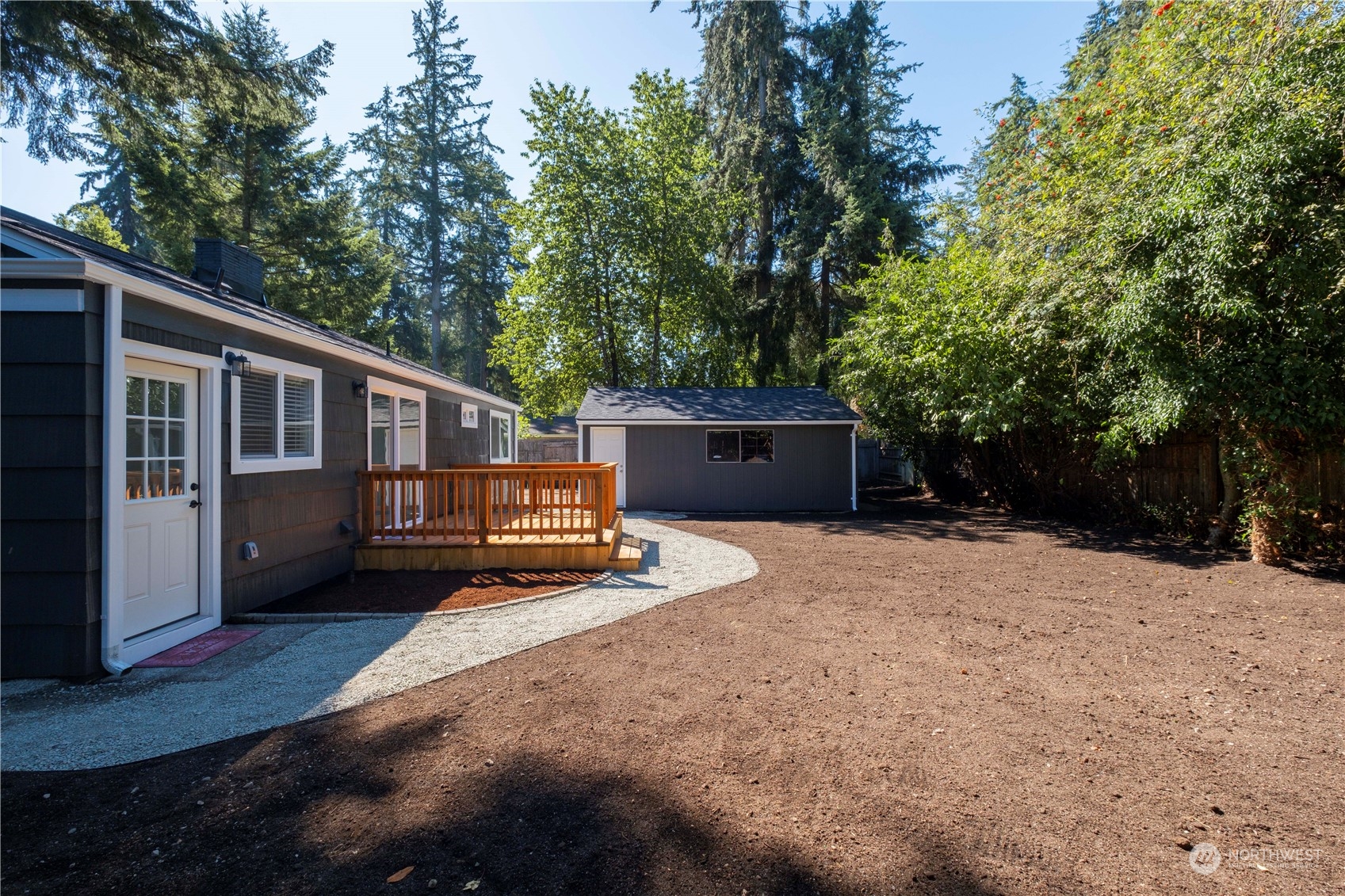 11610 Tower Road Southwest Lakewood, WA 98498 - Photo 24 of 35 a front view of a house with a yard and tree s