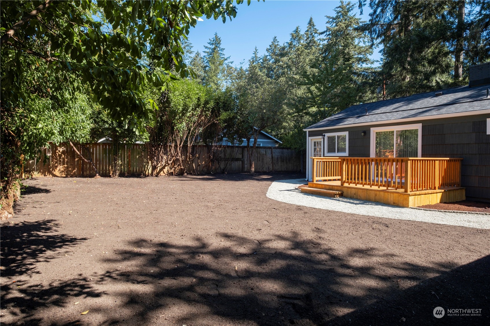 11610 Tower Road Southwest Lakewood, WA 98498 - Photo 26 of 35 a view of a house with a yard covered in snow