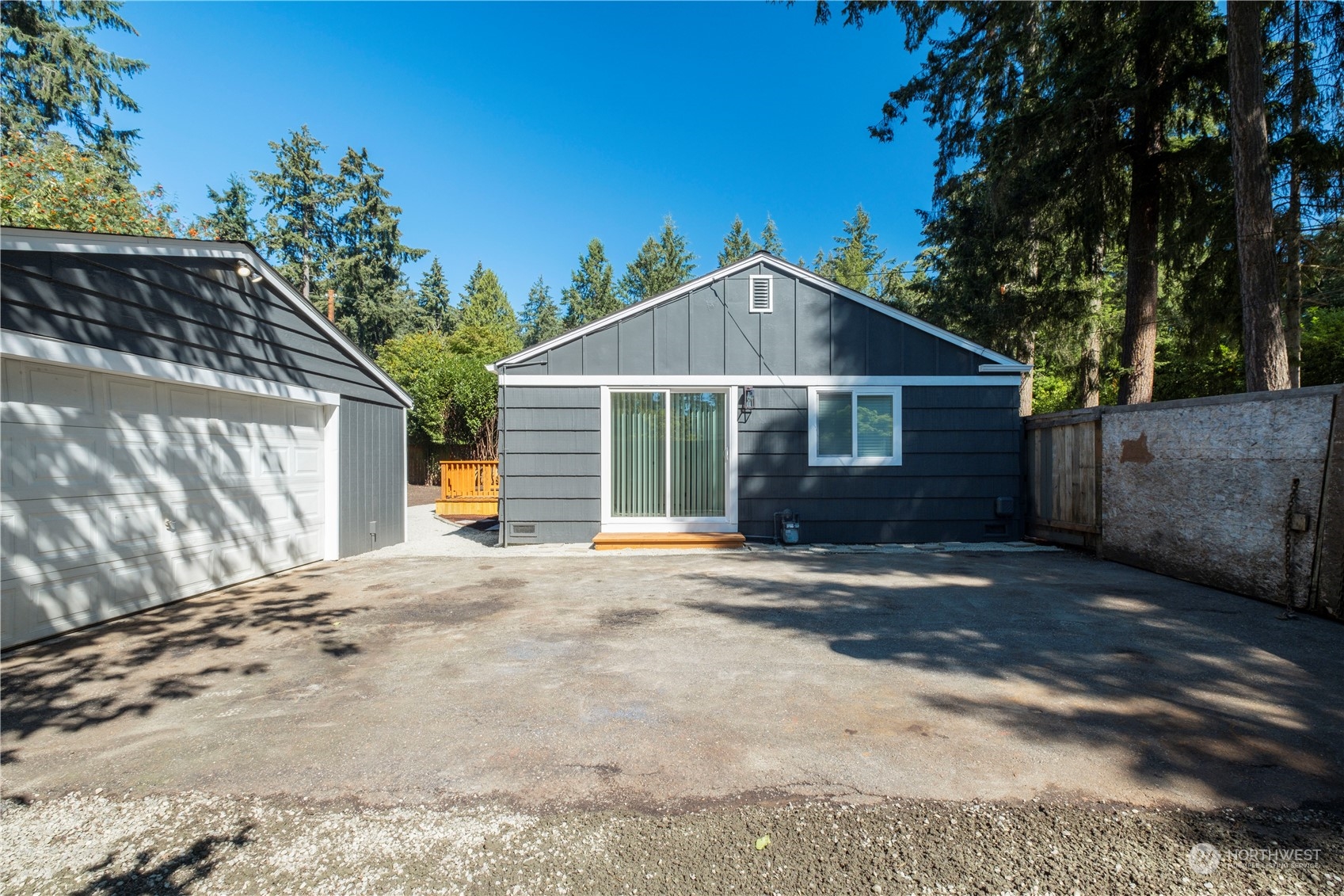 11610 Tower Road Southwest Lakewood, WA 98498 - Photo 30 of 35 a front view of a house with a garden