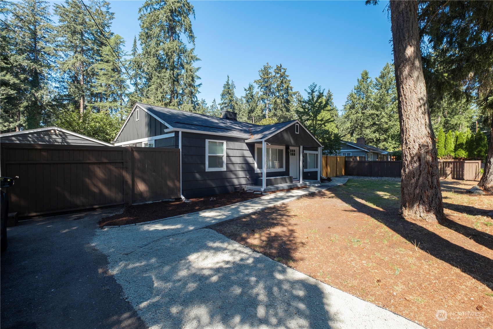 11610 Tower Road Southwest Lakewood, WA 98498 - Photo 33 of 35 front view of a house with a yard