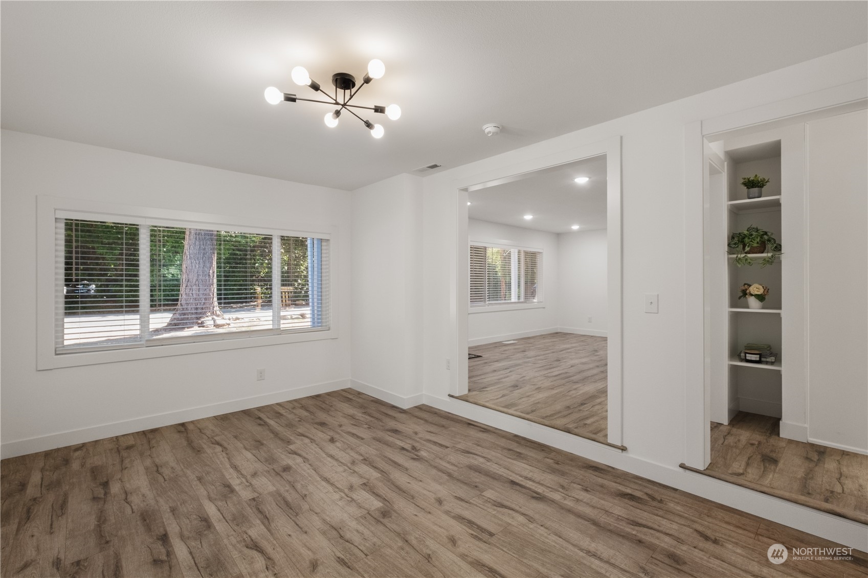 11610 Tower Road Southwest Lakewood, WA 98498 - Photo 10 of 35 a view of an empty room with a window