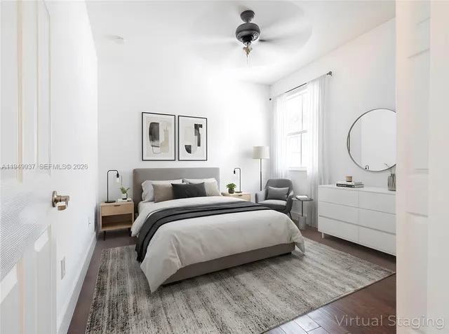 a kitchen with stainless steel appliances kitchen island granite countertop a stove top oven a sink a counter space and cabinets