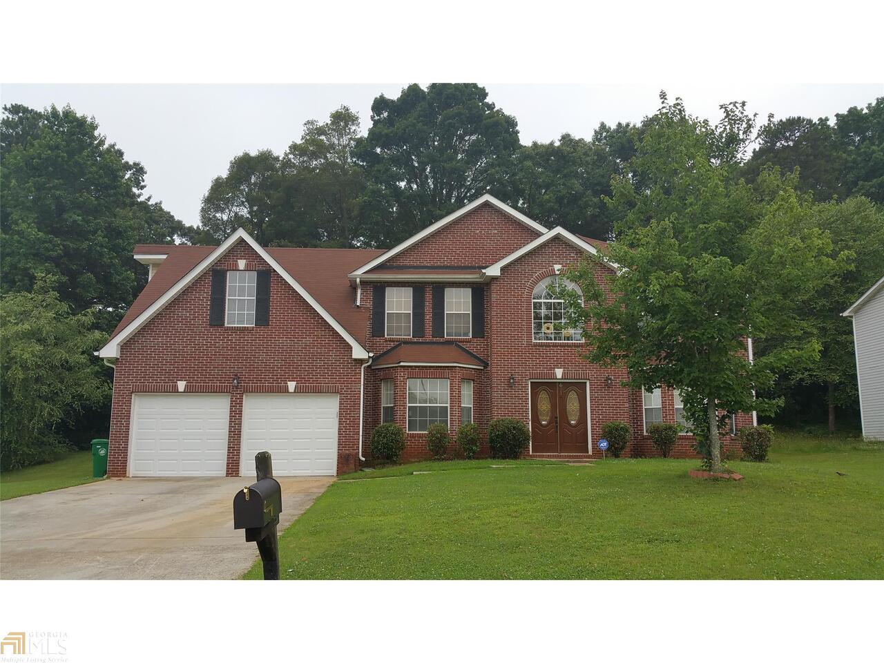 2279 Eagles Nest Circle Decatur, GA 30035 - Photo 1 of 1 a black and white photo of a house