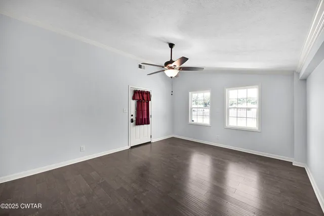a kitchen with a sink stove and microwave
