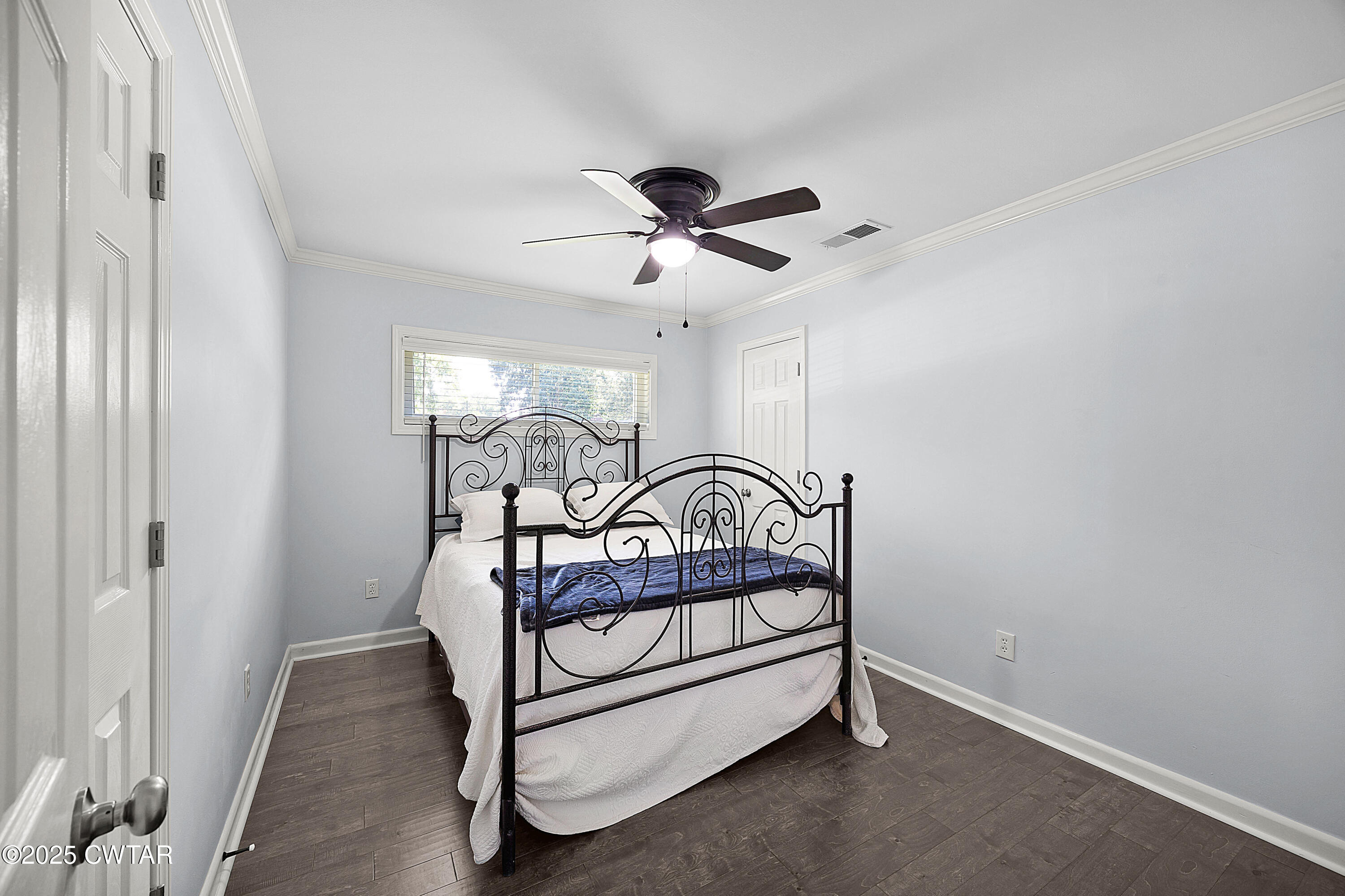 105 Dixie Lane Jackson, TN 38301 - Photo 17 of 25 a view of a hallway with a chandelier fan