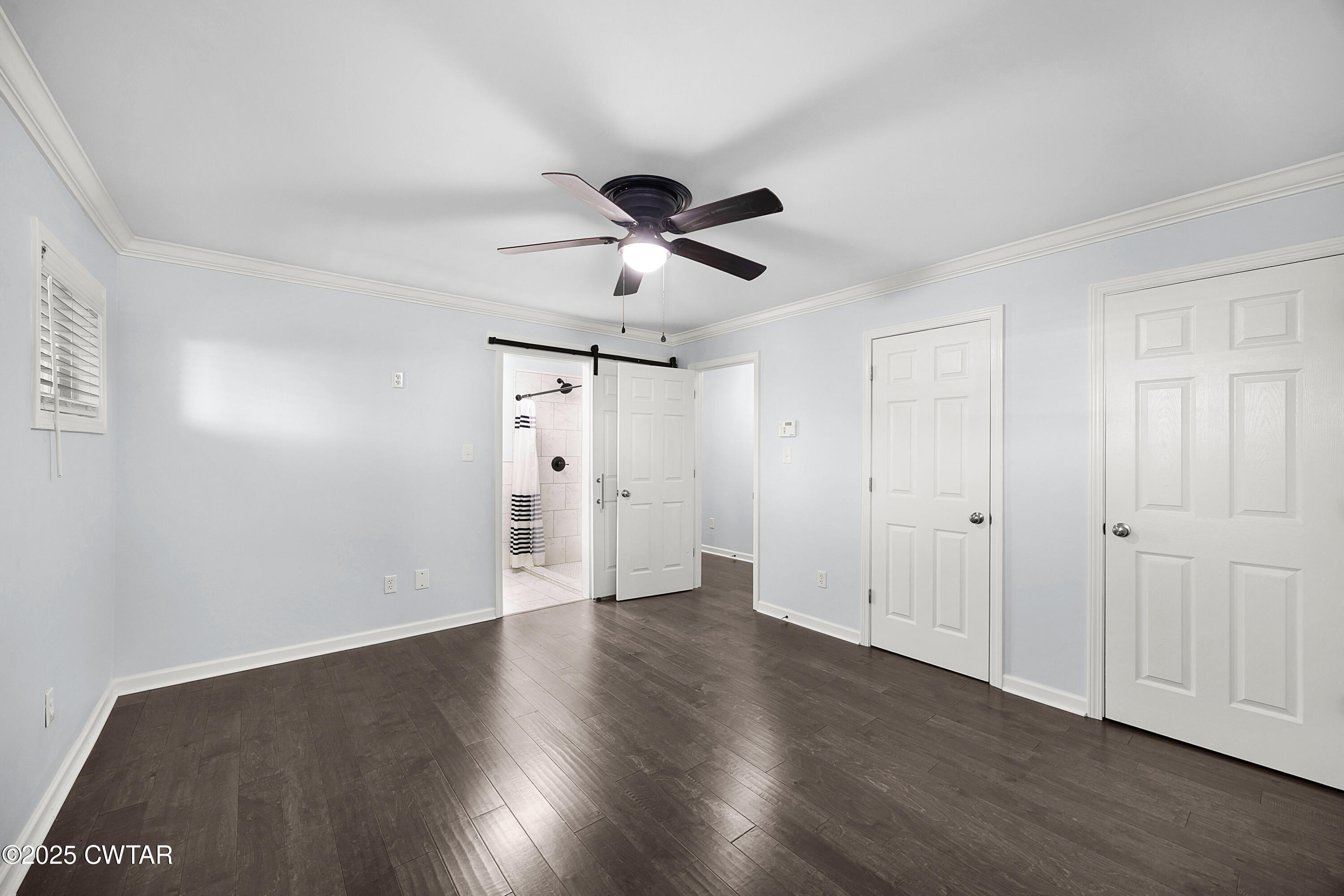 105 Dixie Lane Jackson, TN 38301 - Photo 19 of 25 a view of an empty room and wooden floor