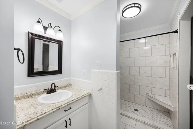 a view of an empty room and wooden floor