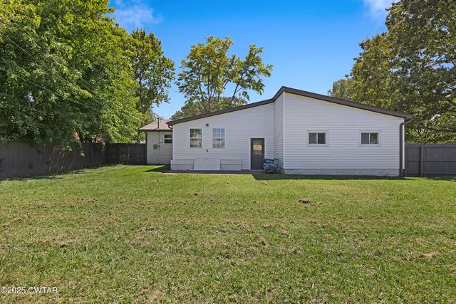a view of a lake with a big yard