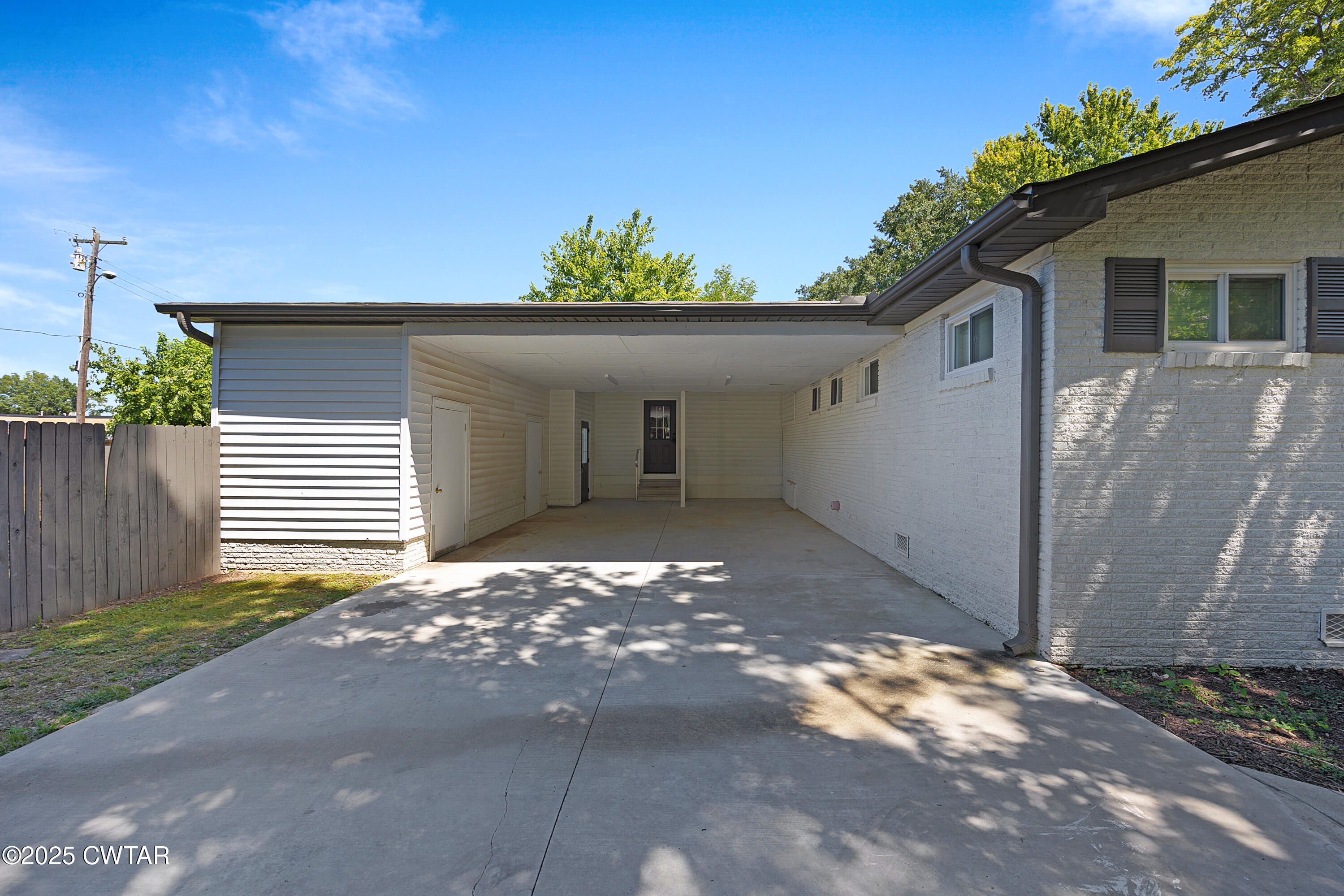 105 Dixie Lane Jackson, TN 38301 - Photo 24 of 25 a view of a house with a yard