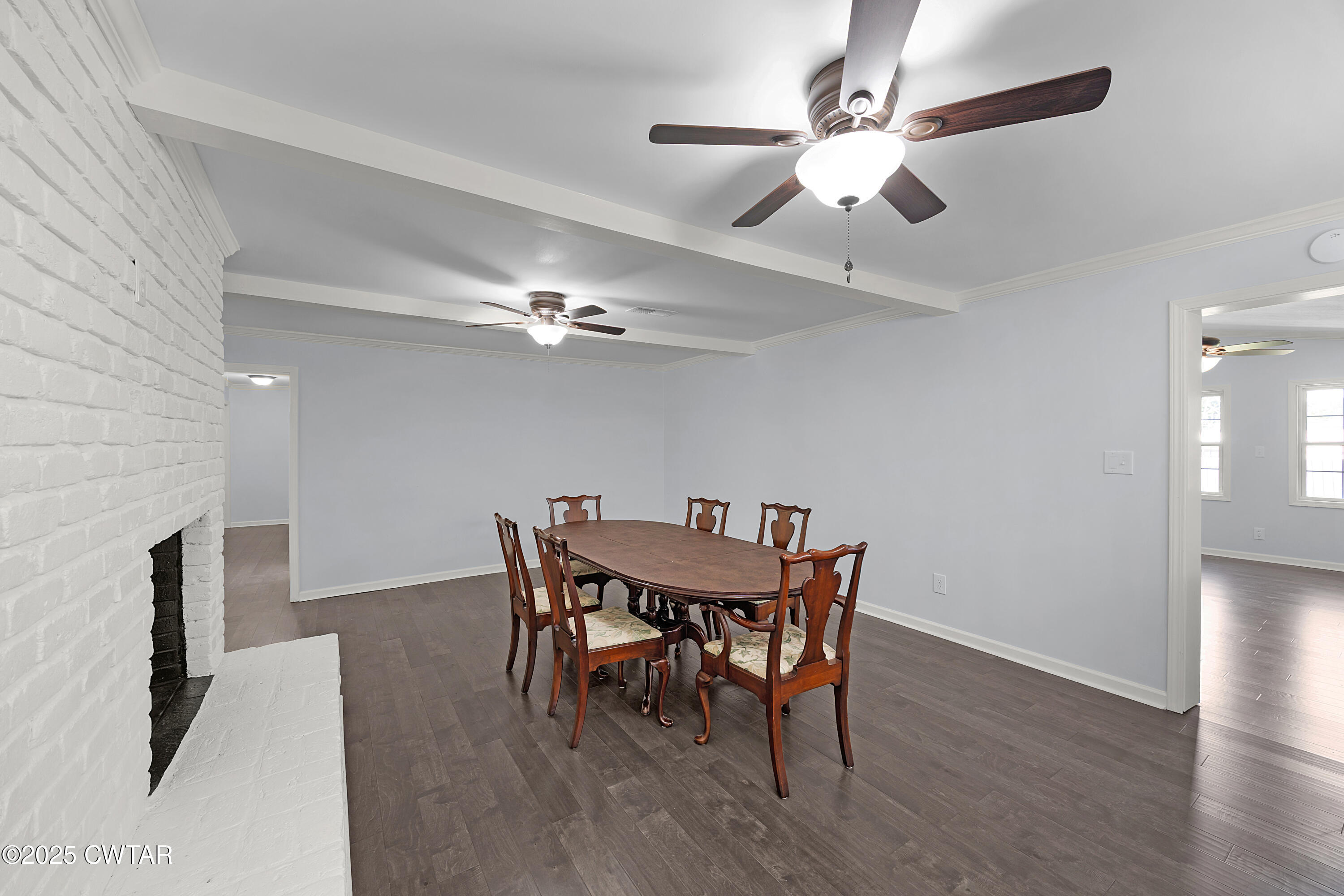 105 Dixie Lane Jackson, TN 38301 - Photo 7 of 25 a view of a dining room with furniture and wooden floor