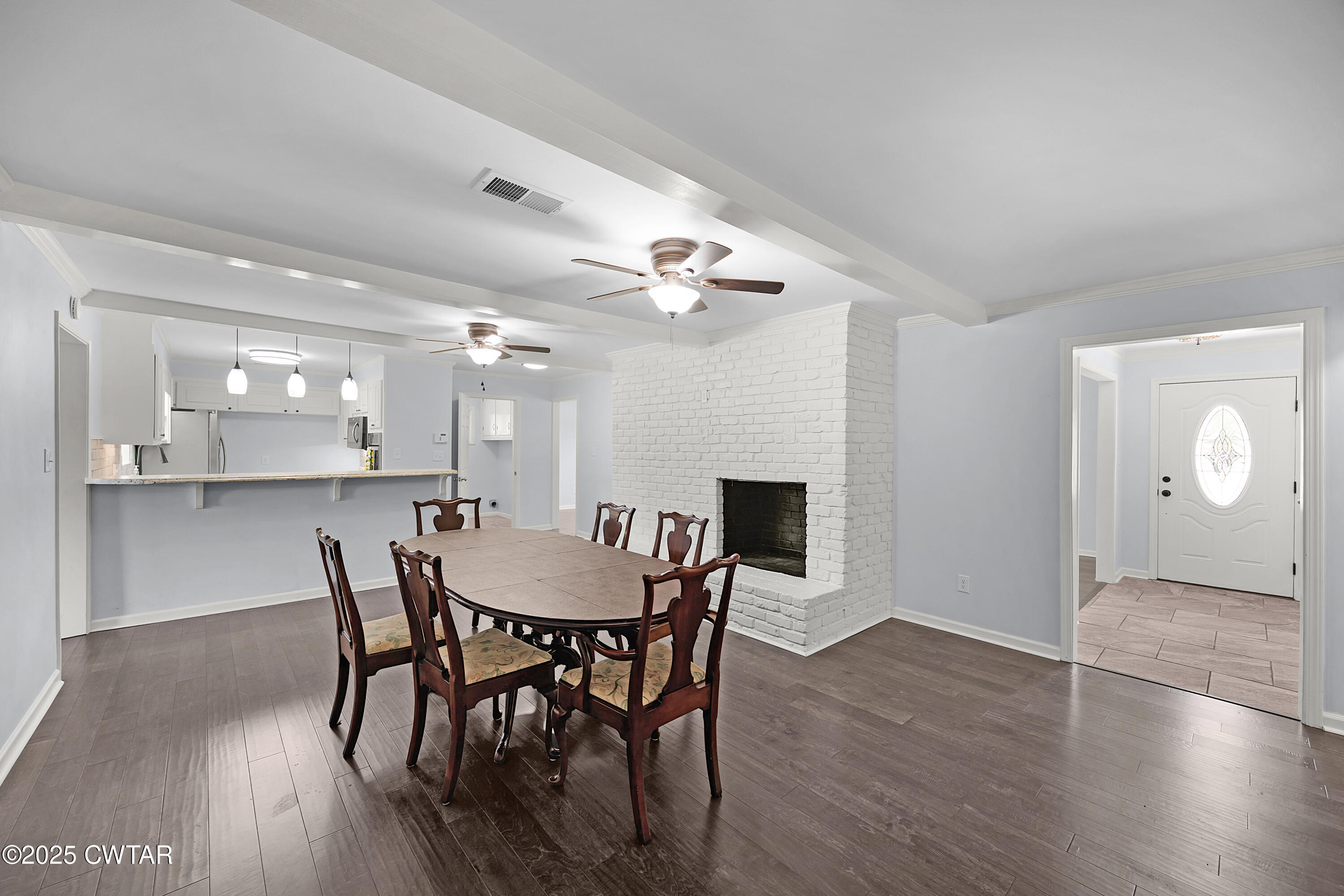 105 Dixie Lane Jackson, TN 38301 - Photo 9 of 25 a view of a dining room with furniture and wooden floor