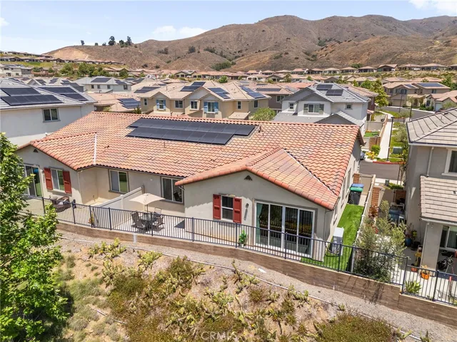 an aerial view of residential houses and street