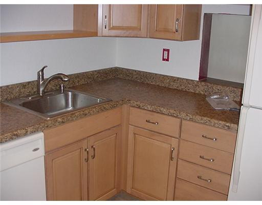 7901 South Colony Circle, Unit 203 Tamarac, FL 33321 - Photo 3 of 10 Kitchen