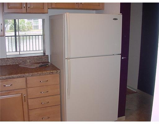 7901 South Colony Circle, Unit 203 Tamarac, FL 33321 - Photo 4 of 10 Kitchen