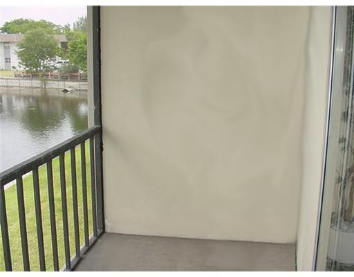 7901 South Colony Circle, Unit 203 Tamarac, FL 33321 - Photo 8 of 10 Patio/Deck