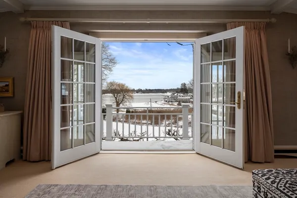 a view of a glass door and a window