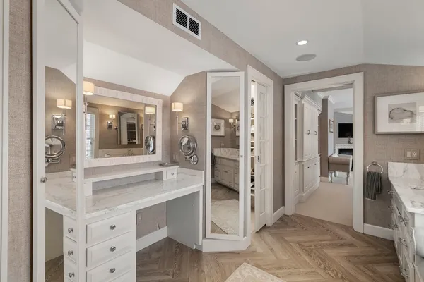 a spacious bathroom with a shower and a sink