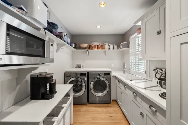 a kitchen with a stove and a refrigerator